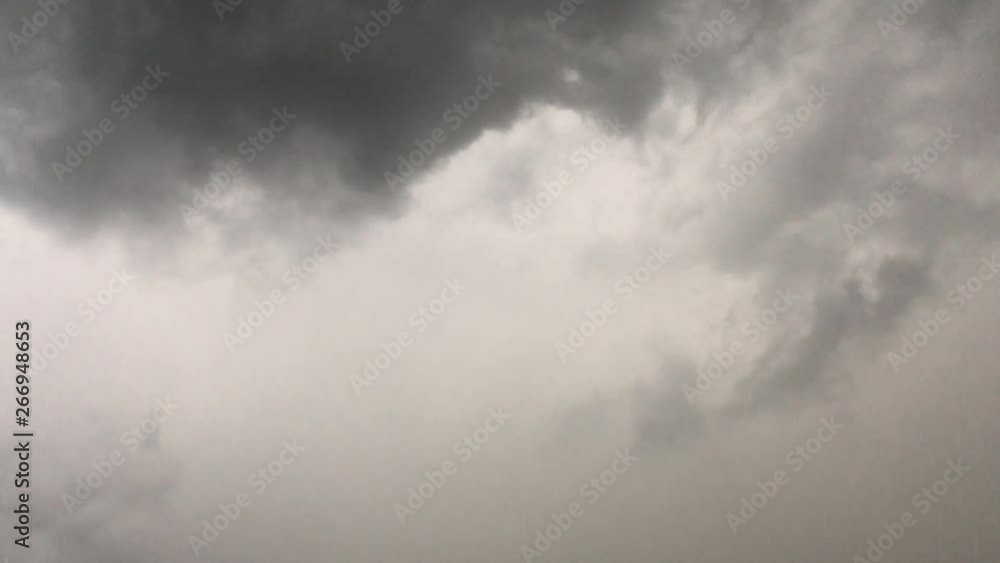 Lightning flashes from a dark cloud during a thunderstorm. Cloudy weather, rain. The video is looped. Lightning flashes from a dark cloud during a thunderstorm. Cloudy weather, rain. The video is looped.