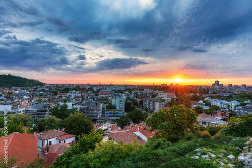 sunset over Plovdiv city, Bulgaria. Panoramic view from one of the hills - Nebet tepe with walls from ancient fortress. European capital of culture 2019.