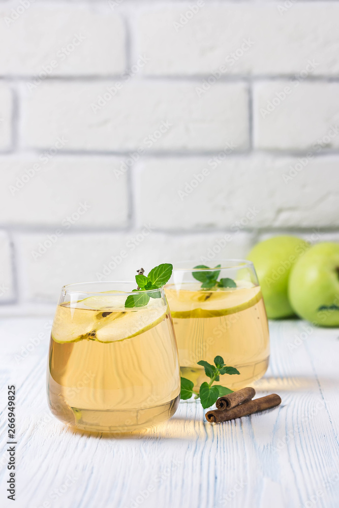 Apple cinnamon kombucha. Selective focus, space for text. Apple cinnamon kombucha. Selective focus, space for text.