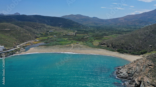 Aerial drone photo of famous beach of Kolympithres with deep turquoise sea, Tinos island, Cyclades, Greece © aerial-drone