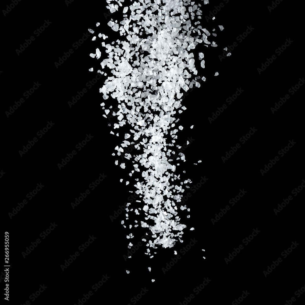 Fototapeta premium Large White Sea Salt Falling On A Black Background.