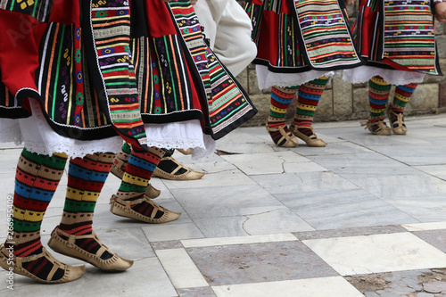 Fotografie Gara Bov, Bulgaria - May 4, 2019: People dressed with traditional Bulgarian auth