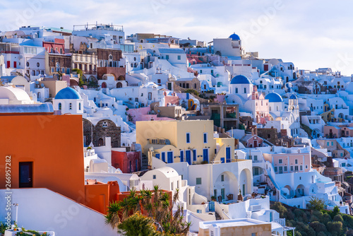 Santorini landscape with view of whitewashed buildings and churches in Oia, Greece