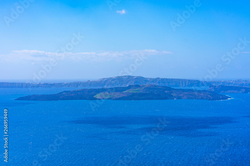 Santorini landscape - view of vast volcano caldera filled with water, Greece