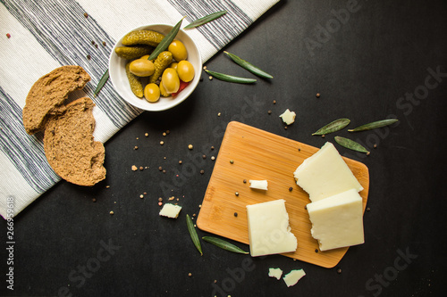 Kasseri Greek cheese with olives and rusk bread