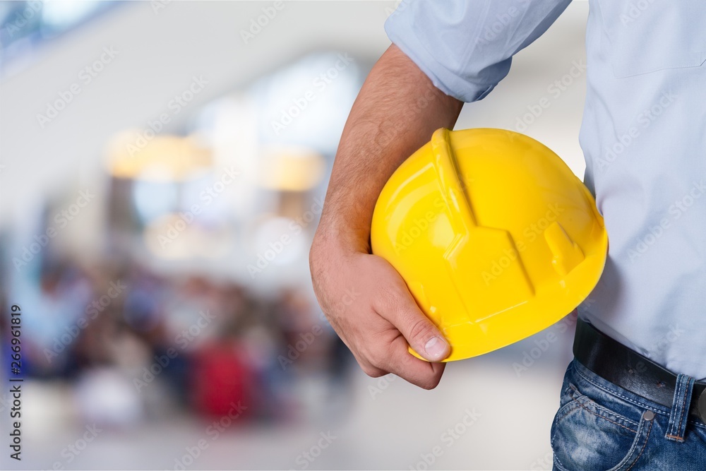 Male worker with tool belt isolated on white background Male worker with tool belt isolated on white background