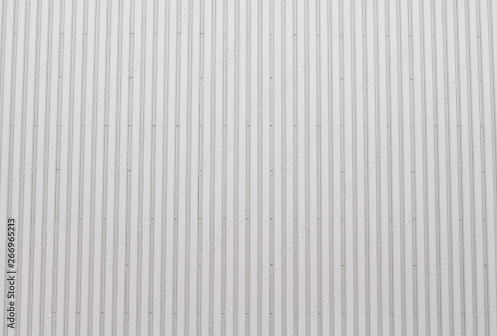 Grey metal lined wall background Grey metal lined wall background