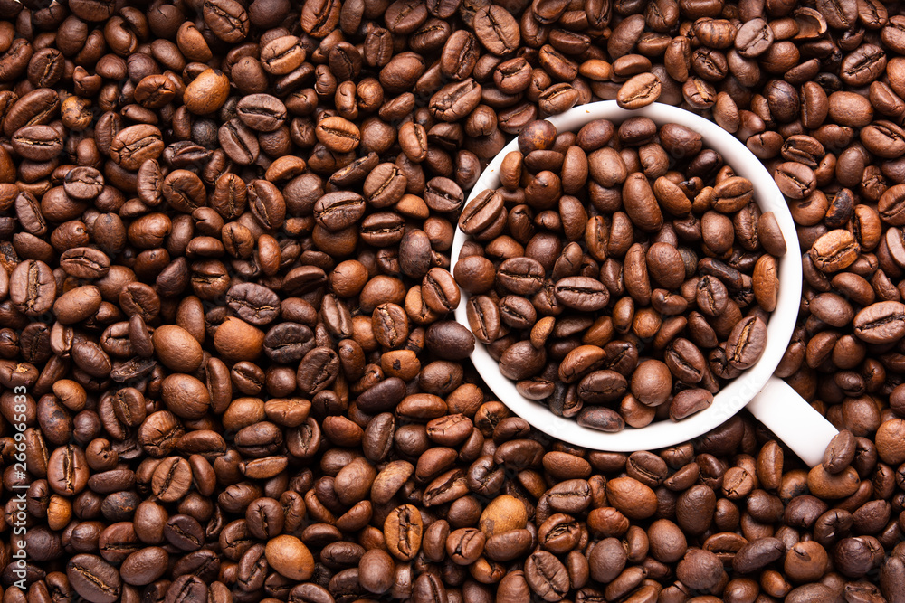 white cup of coffee beans top view white cup of coffee beans top view