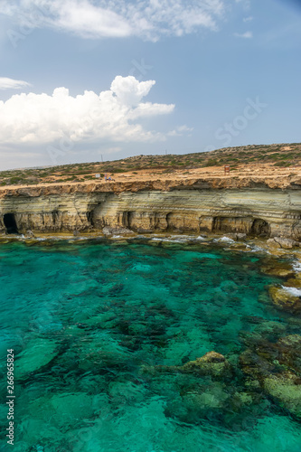 Picturesque sea caves are located on the Mediterranean coast. © Sergej Ljashenko