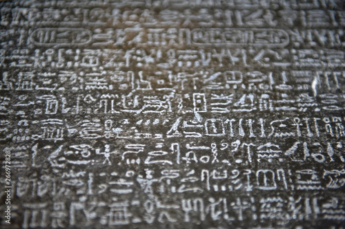image of a wall with hieroglyphs, rosetta stone photo