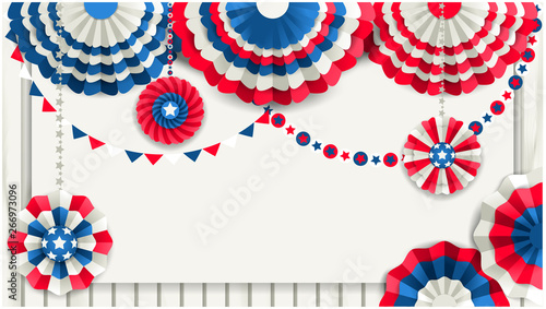 Patriotic poster with paper fans hanging on a wooden fence