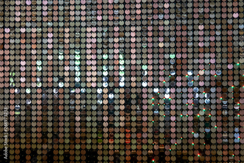 Sequin wall with light reflection for luxury interior wall decoration.