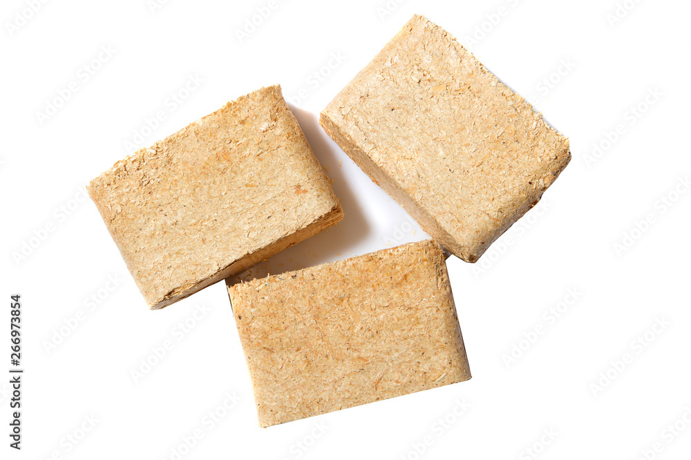 Alternative fuel, bio fuel. Wood sawdust briquettes on white background. Alternative fuel, bio fuel. Wood sawdust briquettes on white background.