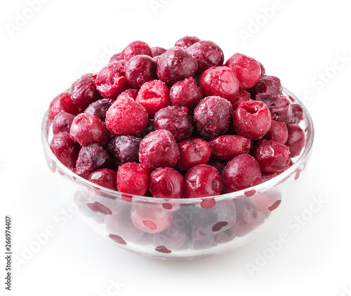 Obraz na płótnie Frozen cherries in glass bowl isolated on white background with clipping path w salonie