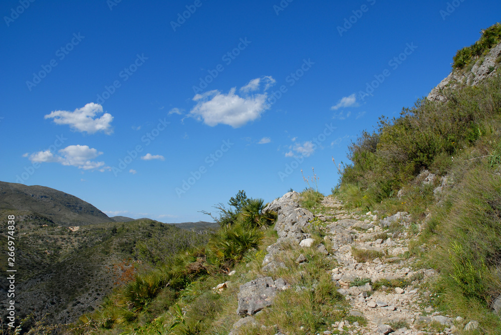 Historic Mozarabic mule trail in the Vall de Laguart, Alicante Province, Spain. The stepped tracks are now a popular hiking route. Historic Mozarabic mule trail in the Vall de Laguart, Alicante Province, Spain. The stepped tracks are now a popular hiking route.