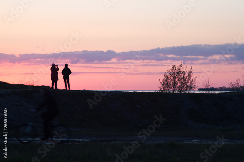 couple walking on the beach at sunset © Viktor