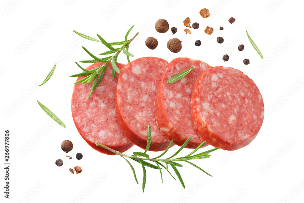 sliced sausage salami with rosemary and peppercorns isolated on white background. top view
