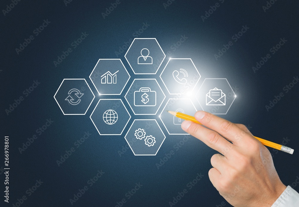 Man holding business elements icons on screen Man holding business elements icons on screen