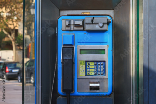 Public phone booth in Spain city Malaga