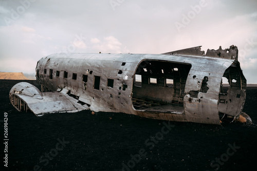 Damaged plane in desolated field