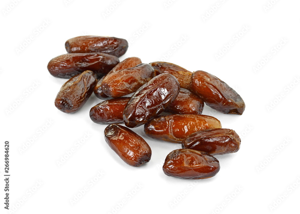 Dried dates over white background. Heap of dried dates isolated on white background. Dried dates over white background. Heap of dried dates isolated on white background.