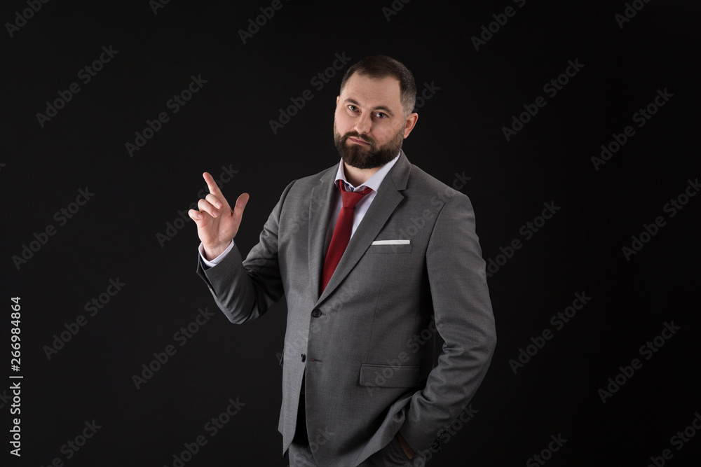 young bearded business man with pointing gesture young bearded business man with pointing gesture