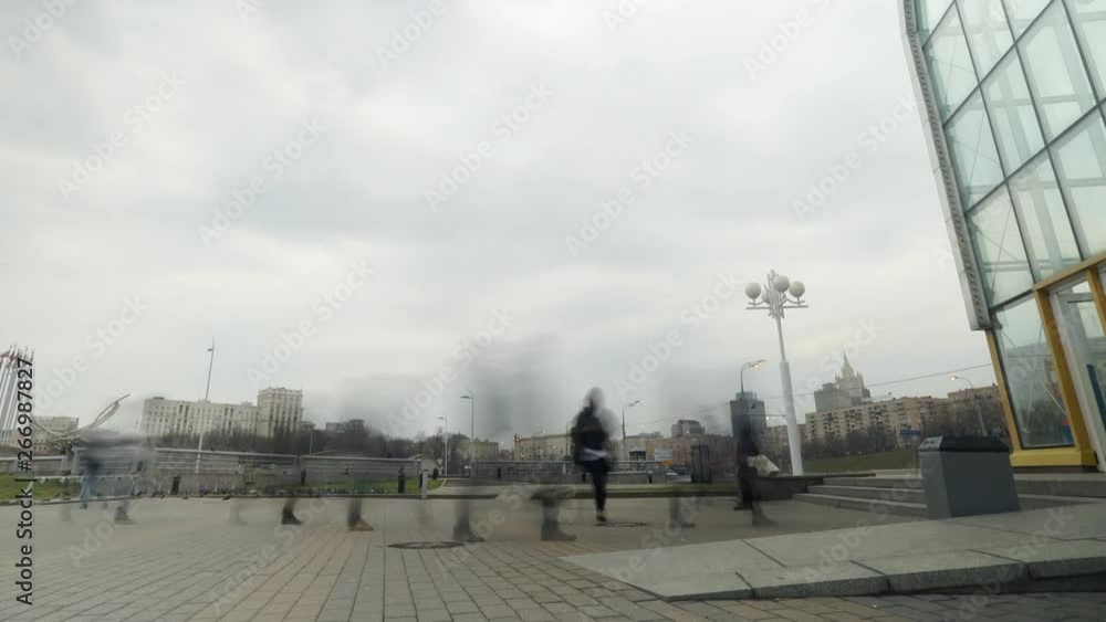 Time lapse of people movement to the glass pedestrian crossing in rainy weather in Moscow. Moscow life