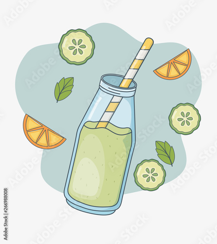 orange and cucumber juice bottle with straw