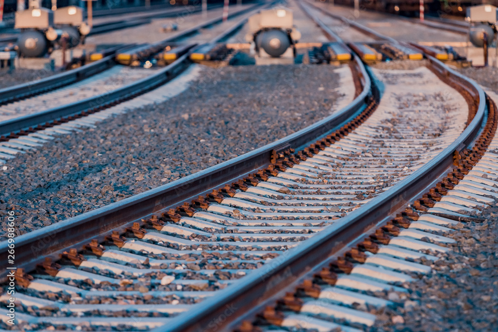 View of the rails, concrete sleepers and mound of crushed stone. The railroad tracks. View of the rails, concrete sleepers and mound of crushed stone. The railroad tracks.