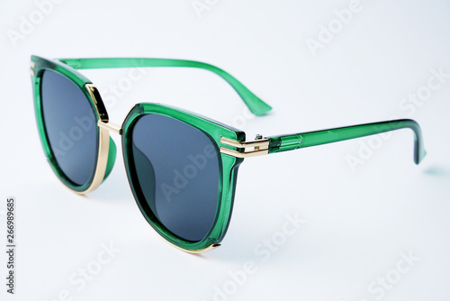 Green plastic sun glasses with polarization lens