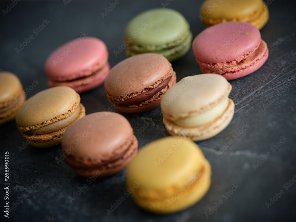 bright fresh tasty macaron biscuits on grey board bright fresh tasty macaron biscuits on grey board