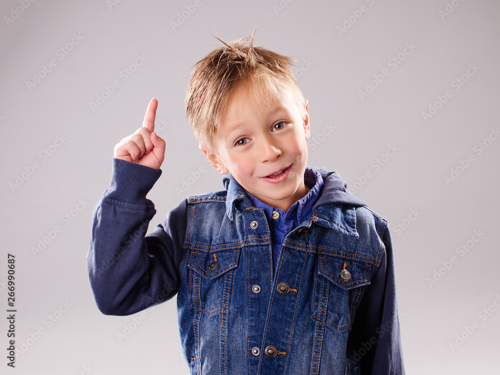 Little boy with raised finger Little boy with raised finger