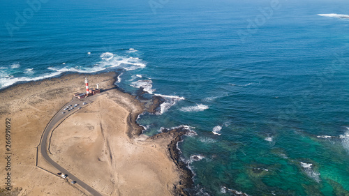 aerial view of lighthouse at sunset