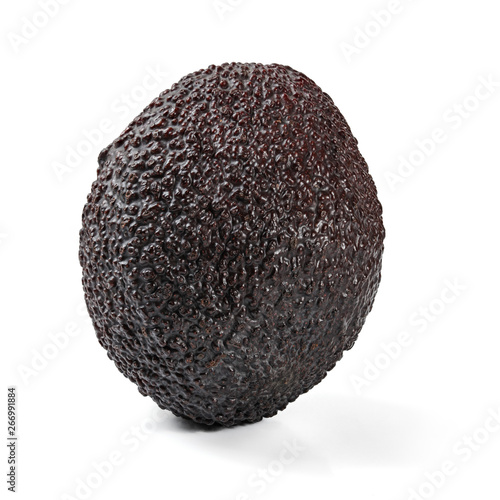 Single ripe dark brown (bilse variety) avocado isolated on white background © Lubo Ivanko