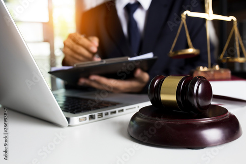 Lawyer working with laptop and interface icon
