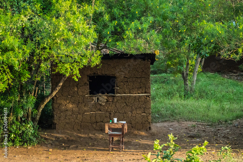 near Kisumu, Kenya - March 8, 2019 - a traditional african mud house photo