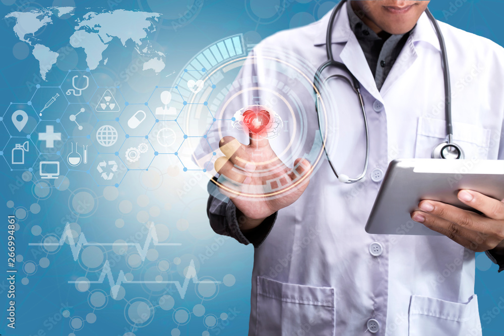 young doctor with stethoscope and using interface icon young doctor with stethoscope and using interface icon