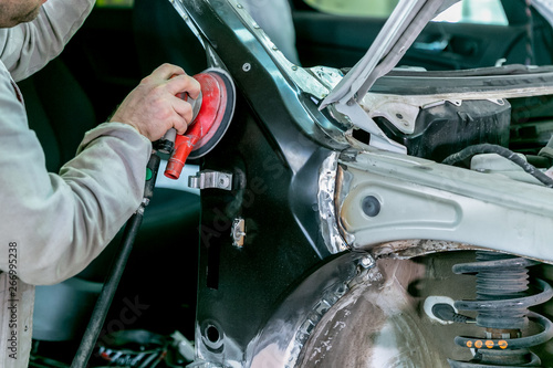 Schilderij op canvas Car repair in car service