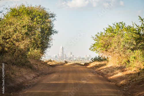 distant view of Nairobi city center - capital city of Kenya, East Africa - from Nairobi National Park photo