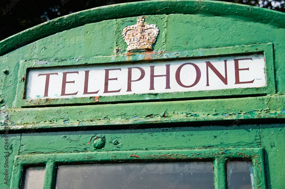 Fototapeta premium Telephone box which has been painted green, traditionally done in Ireland.