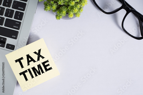 Tax Time Concept On Sticky Note photo