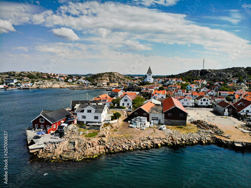 Skarhamn harbor on a sunny summer day.  Located on the Bohuslan Coast, Tjorn, Vastra Gotaland County in Soutwestern Sweden. photo