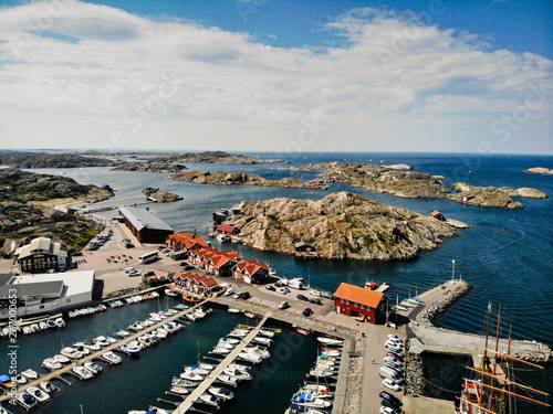 Skarhamn harbor aerial on a sunny summer day. Located on the Bohuslan Coast, Tjorn, Vastra Gotaland County in Southwestern Sweden. photo