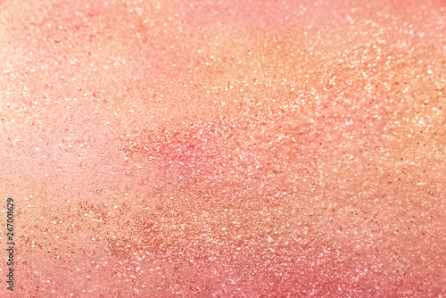 Classic living coral, peach, salmon glitter background with selective focus - abstract texture