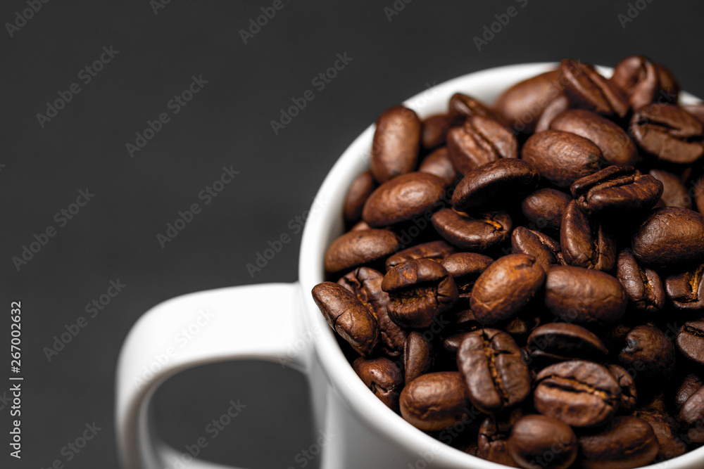 Freshly ground roasted coffee beans with fruits of coffee plant, full of grains. Freshly ground roasted coffee beans with fruits of coffee plant, full of grains.