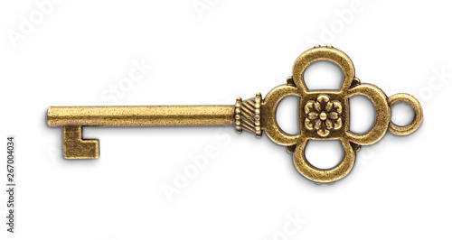 Vintage golden skeleton key isolated on white background