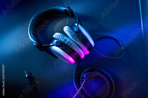 Top view of professional mastering headphones in a home recording studio.