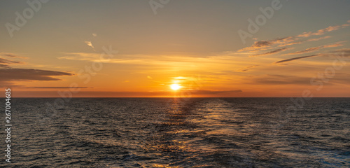 Sunset from the ferry over water