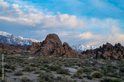 tiny RV and camper amid rock formations Alabama HIlls Sierra Nevada mountains California