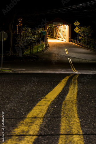 West Cornwall, Connecticut USA The famous covered bridge over the Housatonic River photo